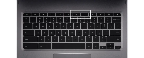 User adjusting Chromebook screen brightness with keyboard keys